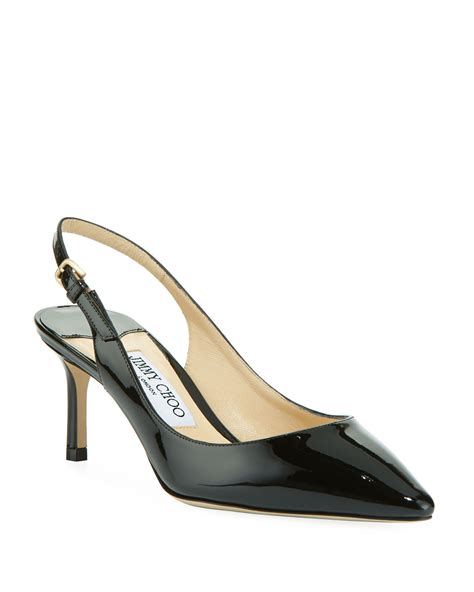 Patent leather slingback pumps .